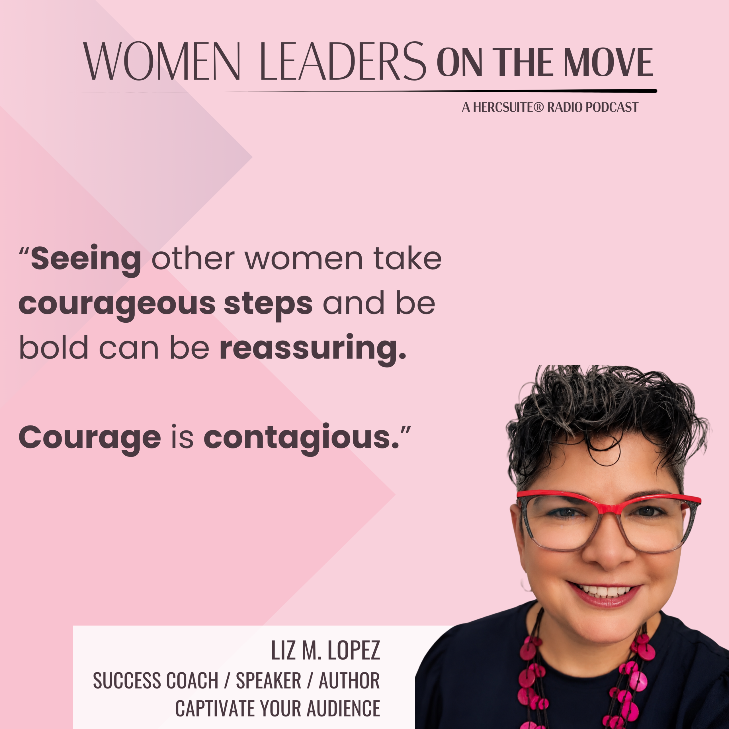 Liz M. Lopez smiling in a black top with a hot pink necklace and pink glasses